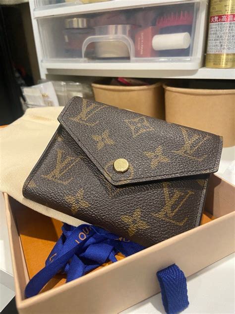 louis vuitton victoria wallet.